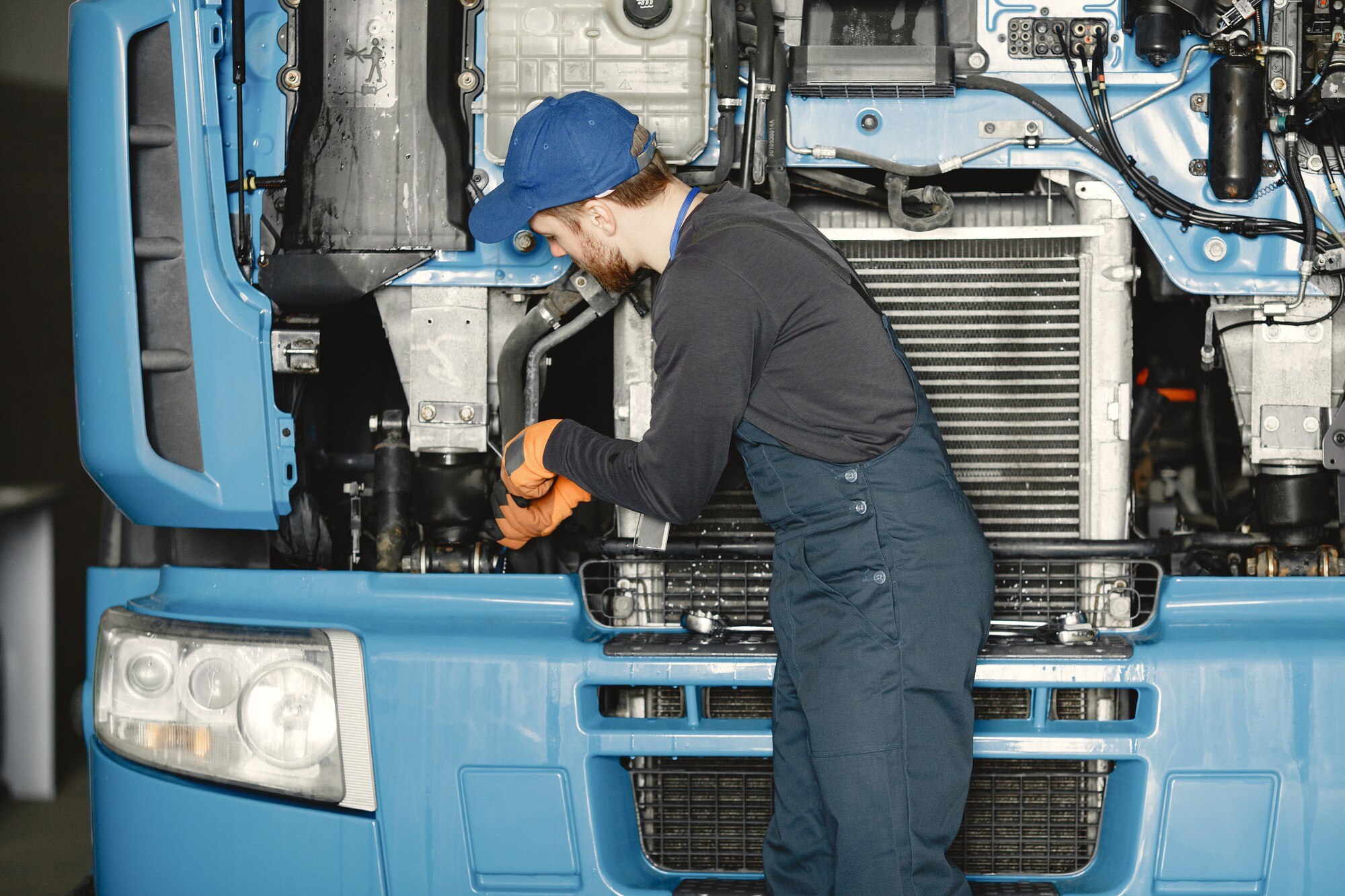 Man Repairing a Truck